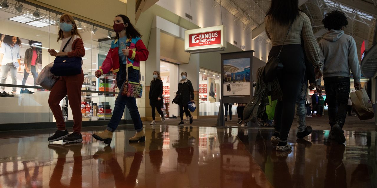 Shoppers Boosted Spending Last Month, Taking on Higher Prices