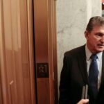 Democrats’  Trillion Package Stalls as Manchin Talks Bog Down