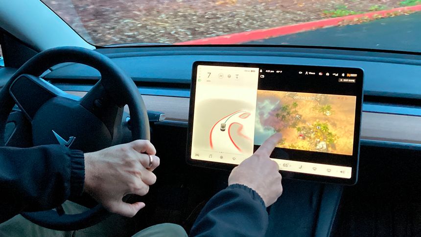 Tesla’s Touch-Screen Gaming Probed by U.S. Auto-Safety Regulator