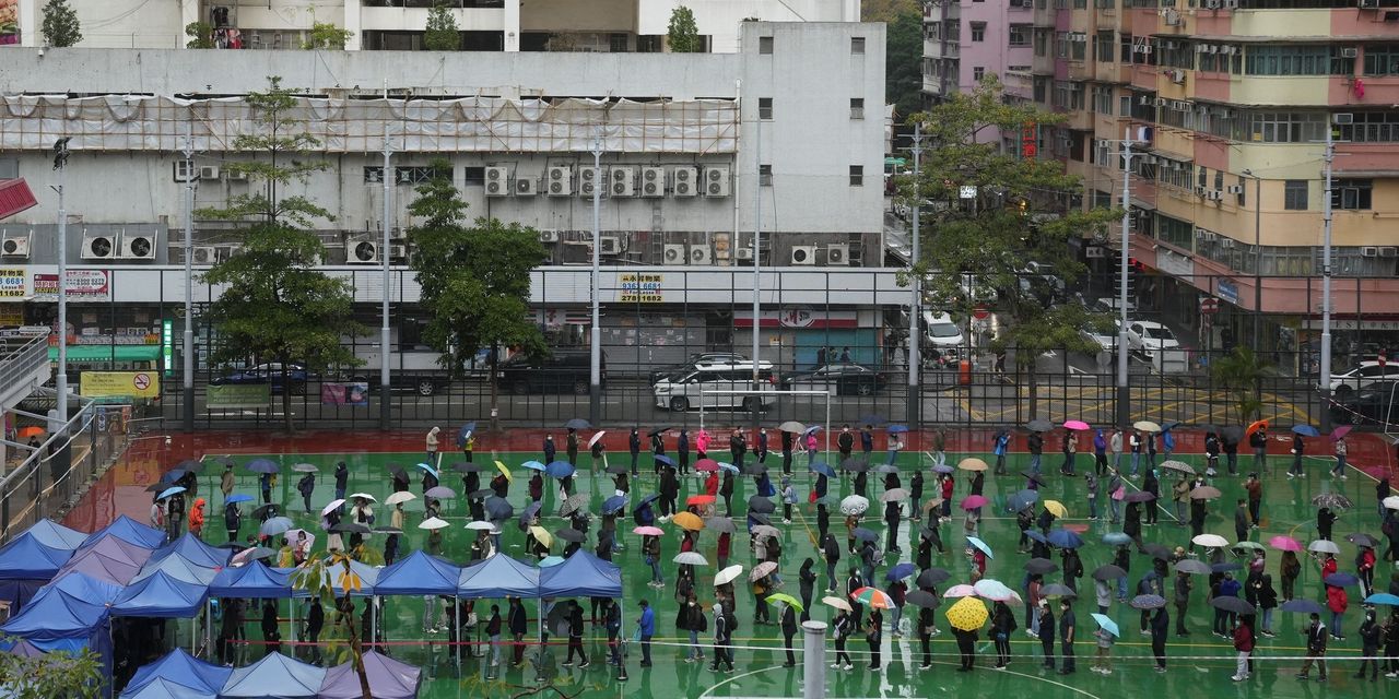 Hong Kong Considers Citywide Testing as Omicron Overwhelms Defenses