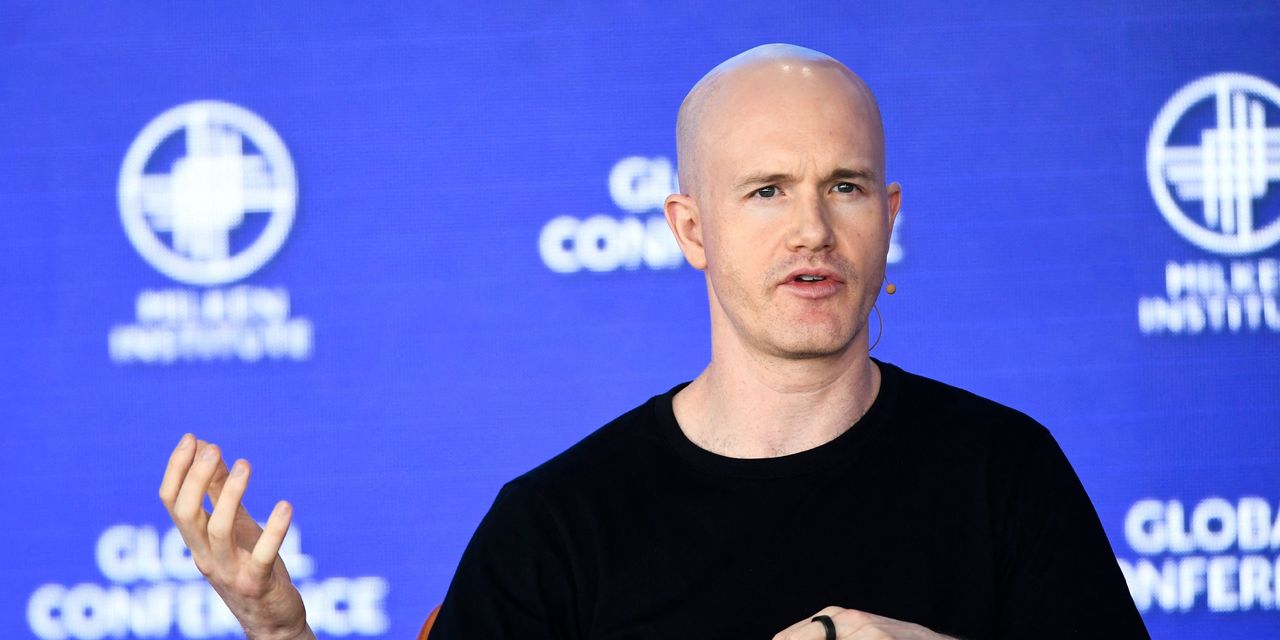 Coinbase Shares Slide Further on Deep Loss